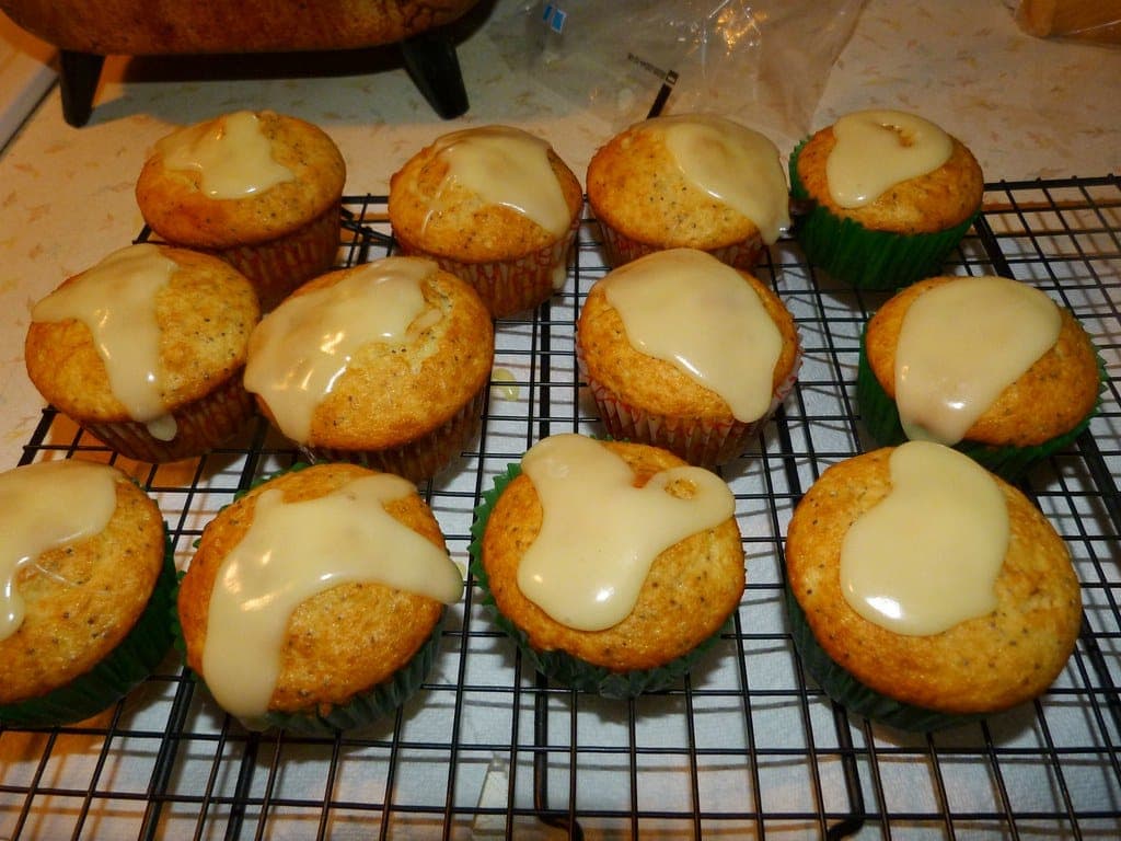Glazed muffins cooling on a wire rack
