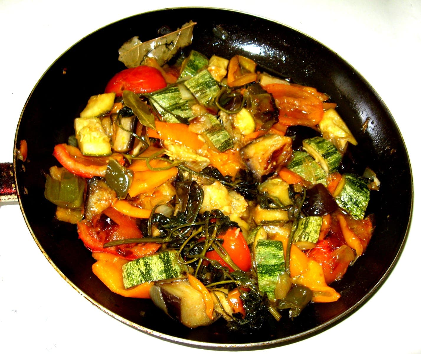 Skillet of ratatouille with zucchini, eggplant, peppers and tomatoes